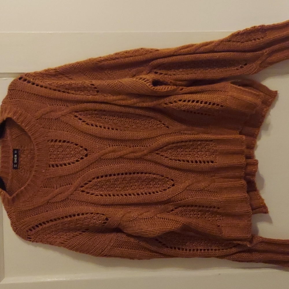 Orange knitted sweater